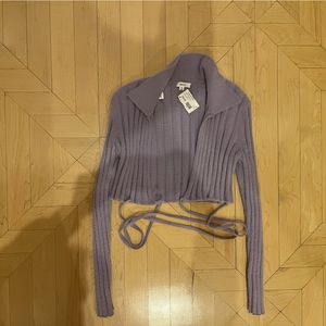 UNWORN wrap around cropped sweater